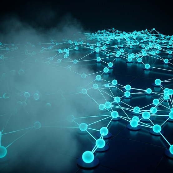 A network of glowing nodes on a dark floor, fog lifting from the left to reveal the full network resolved and clear